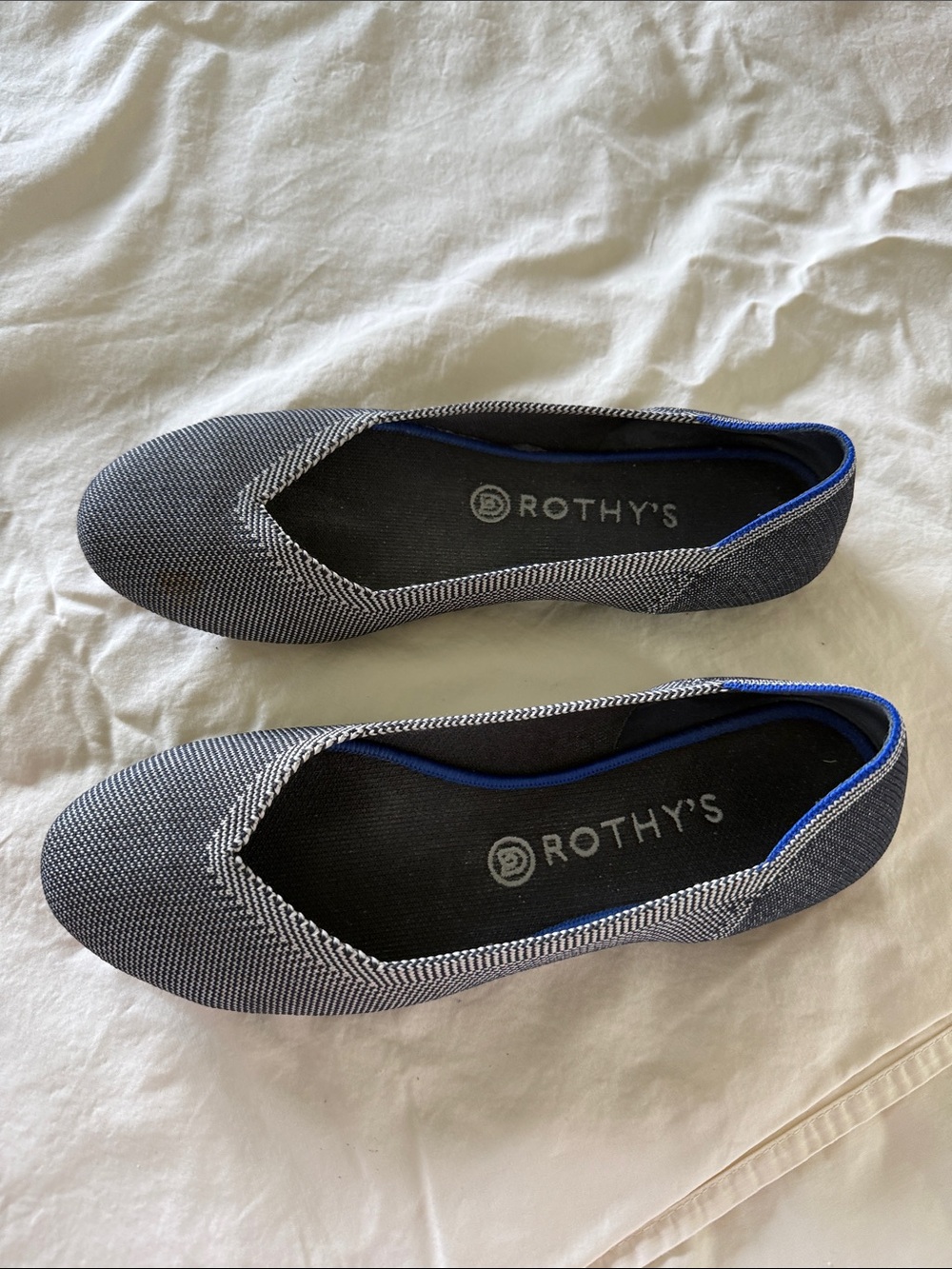 Rothy's Black and White Knit Slip-On Flats with Blue Trim